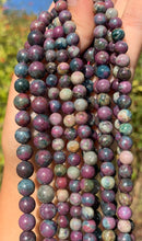 Charger l'image dans la galerie, Perles en rubis cyanite entre 6 et 8mm