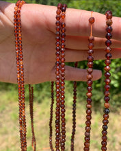 Charger l'image dans la galerie, Perles en grenat hessonite facettées entre 2 et 4mm