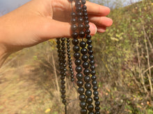 Charger l'image dans la galerie, Perles en jade néphrite noir entre 6 et 8mm