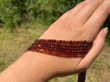 Charger l'image dans la galerie, Perles en grenat hessonite facettées entre 2 et 4mm