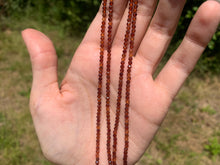 Charger l'image dans la galerie, Perles en grenat hessonite facettées entre 2 et 4mm