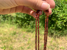Charger l'image dans la galerie, Perles en grenat hessonite facettées entre 2 et 4mm