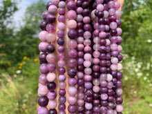 Charger l'image dans la galerie, Perles en sugillite entre 6 et 10mm