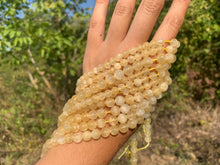 Charger l'image dans la galerie, Perles en aragonite jaune entre 6 et 8mm