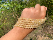 Charger l'image dans la galerie, Perles en aragonite jaune entre 6 et 8mm