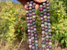 Charger l'image dans la galerie, Perles en rubis cyanite entre 6 et 8mm