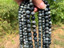 Charger l'image dans la galerie, Perles en oeil d'aigle entre 6 et 10mm OAU