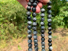 Charger l'image dans la galerie, Perles en oeil d'aigle entre 6 et 10mm OAU