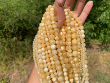 Charger l'image dans la galerie, Perles en calcite jaune entre 4 et 10mm