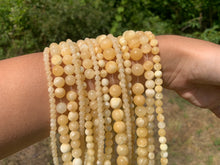 Charger l'image dans la galerie, Perles en calcite jaune entre 4 et 10mm