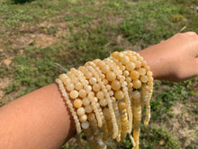 Charger l'image dans la galerie, Perles en calcite jaune entre 4 et 10mm