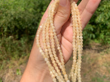 Charger l'image dans la galerie, Perles en calcite jaune entre 4 et 10mm