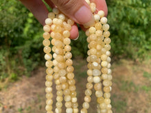 Charger l'image dans la galerie, Perles en calcite jaune entre 4 et 10mm
