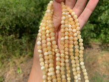 Charger l'image dans la galerie, Perles en calcite jaune entre 4 et 10mm