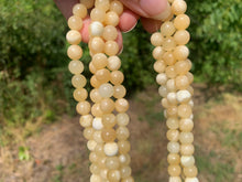 Charger l'image dans la galerie, Perles en calcite jaune entre 4 et 10mm