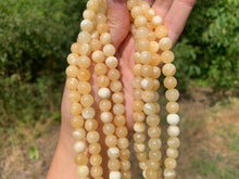 Charger l'image dans la galerie, Perles en calcite jaune entre 4 et 10mm