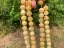Charger l'image dans la galerie, Perles en calcite jaune entre 4 et 10mm