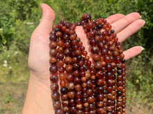 Charger l'image dans la galerie, Perles en grenat hessonite entre 6 et 10mm
