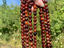 Charger l'image dans la galerie, Perles en grenat hessonite entre 6 et 10mm