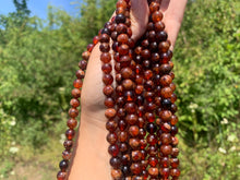 Charger l'image dans la galerie, Perles en grenat hessonite entre 6 et 10mm