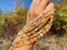 Charger l'image dans la galerie, Perles en quartz hématoïde jaune entre 6 et 10mm