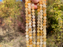 Charger l'image dans la galerie, Perles en quartz hématoïde jaune entre 6 et 10mm