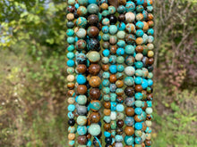 Charger l'image dans la galerie, Perles en turquoise entre 6 et 10mm