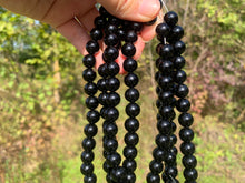 Charger l'image dans la galerie, Perles en agate noire entre 4 et 20mm