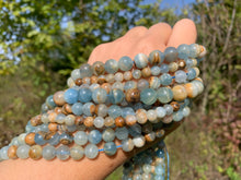 Charger l'image dans la galerie, Perles en calcite bleue entre 6 et 10mm