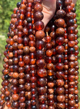 Charger l'image dans la galerie, Perles en grenat hessonite entre 6 et 10mm