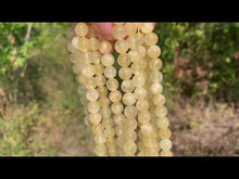 Charger et lire la vidéo dans la visionneuse de la Galerie, Perles en aragonite jaune entre 6 et 8mm