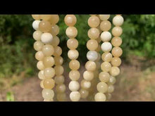 Charger et lire la vidéo dans la visionneuse de la Galerie, Perles en calcite jaune entre 4 et 10mm
