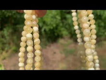 Charger et lire la vidéo dans la visionneuse de la Galerie, Perles en calcite jaune entre 4 et 10mm