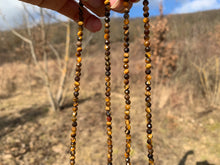 Charger l'image dans la galerie, Perles en oeil de tigre facettées