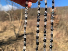 Charger l'image dans la galerie, Quartz avec inclusions de tourmaline facettées 3 x 4mm