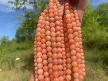 Charger l'image dans la galerie, Perles en calcite orange entre 6 et 8mm