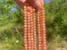 Charger l'image dans la galerie, Perles en calcite orange entre 6 et 8mm