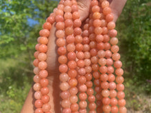 Charger l'image dans la galerie, Perles en calcite orange entre 6 et 8mm