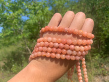 Charger l'image dans la galerie, Perles en calcite orange entre 6 et 8mm