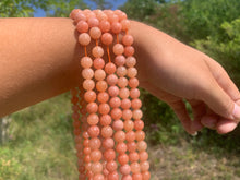 Charger l'image dans la galerie, Perles en calcite orange entre 6 et 8mm
