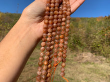 Charger l'image dans la galerie, Perles en pierre de soleil entre 6 et 8mm