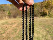 Charger l'image dans la galerie, Perles en obsidienne oeil céleste (arc-en-ciel) facettées entre 6 et 10mm