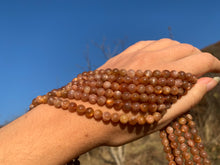 Charger l'image dans la galerie, Perles en pierre de soleil entre 6 et 8mm