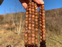 Charger l'image dans la galerie, Perles en pierre de soleil entre 6 et 8mm