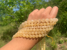 Charger l'image dans la galerie, Perles en calcite jaune entre 6 et 10mm