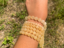 Charger l'image dans la galerie, Perles en calcite jaune entre 6 et 10mm
