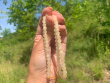 Charger l'image dans la galerie, Perles en calcite jaune entre 6 et 10mm