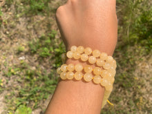 Charger l'image dans la galerie, Perles en calcite jaune entre 6 et 10mm