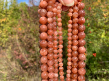 Charger l'image dans la galerie, Perles en pierre de soleil entre 6 et 10mm