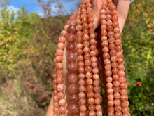 Charger l'image dans la galerie, Perles en pierre de soleil entre 6 et 10mm